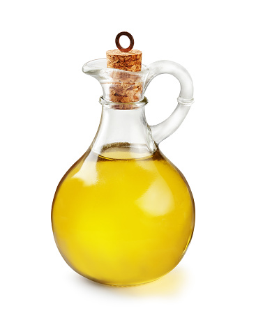 Aceite de oliva en botella sobre fondo blanco. Tarro de aceite aislado. photo