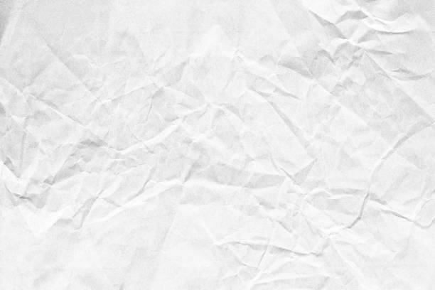 istock White crumpled background paper surface texture macro details 1403864909