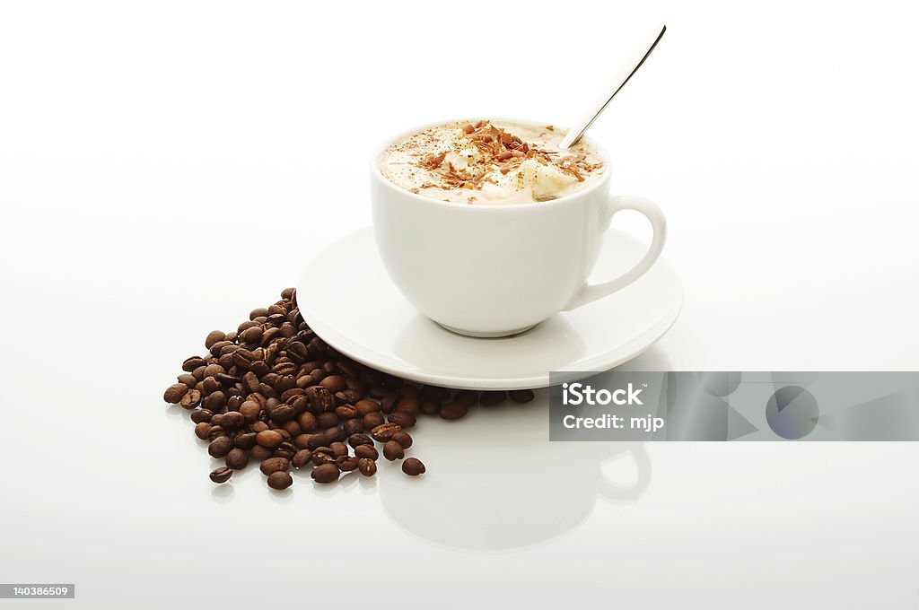 Coffee cup White cup of cappuccino with coffee beans Beige Stock Photo
