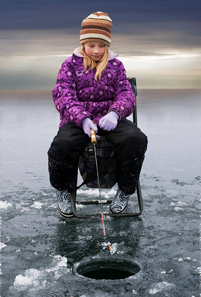 istock Ice Fishing Girl 140386544