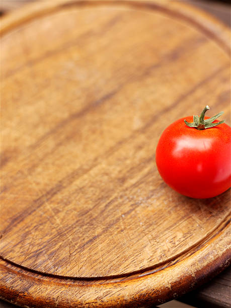tomato on wood stock photo