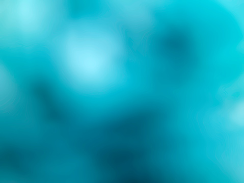 A muted aqua coloured background with areas of denser and paler colour.