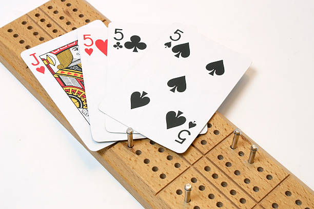 Cribbage board and cards stock photo