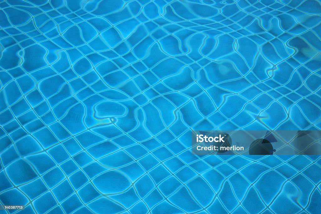 Pool impression 3 I created a series of waves in the pool in order to annihiliate the geometric structure of the rows of tiles. Bizarre Stock Photo