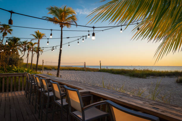 istock Cozy lights at beach bar during dusk. 1403879271