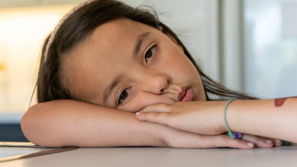 istock A Beautiful Young Girl with a Serious Face 1403879829