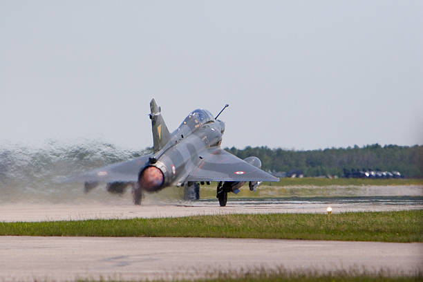Mirage 2000N jet fighter in afterburner on take-off roll at Maple Flag 39 Exercise 2006. Held at Cold Lake, Alberta.