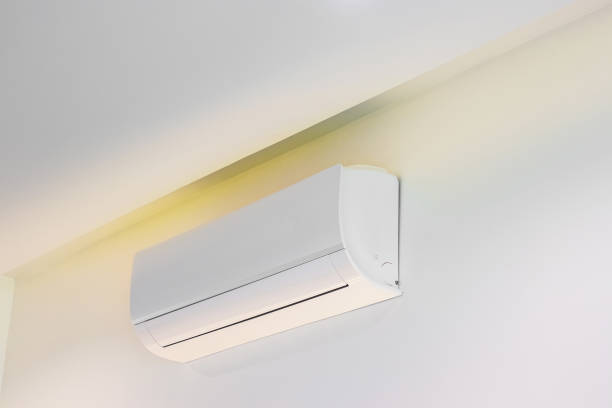 istock CloseUp White air condition on white wall background in house 1403879920