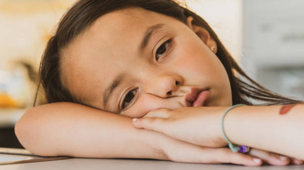 istock A Beautiful Young Girl with a Serious Face 1403880012