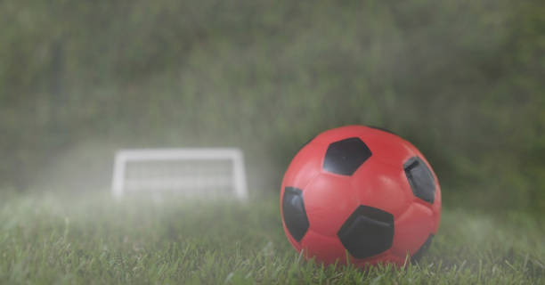 istock Red soccer ball in fog 1403885282