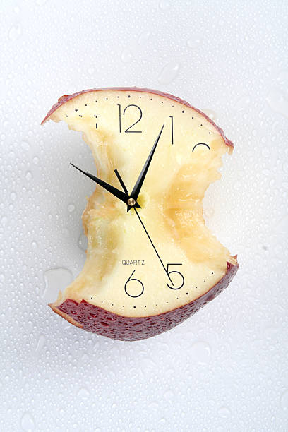 cracked apple of time stock photo