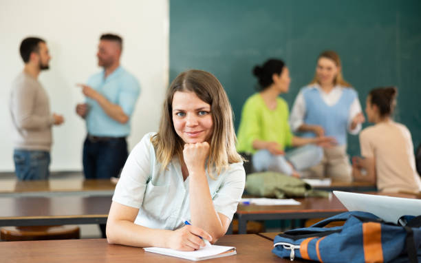 istock Portrait if smiling woman university student 1403886381