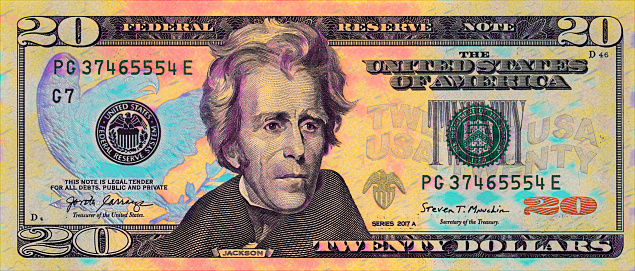 Closeup of colorful front side of 20 dollar banknote for design purpose