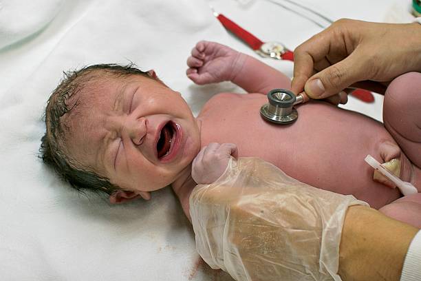 istock Newborn Japanese baby gets first check-up 140388651