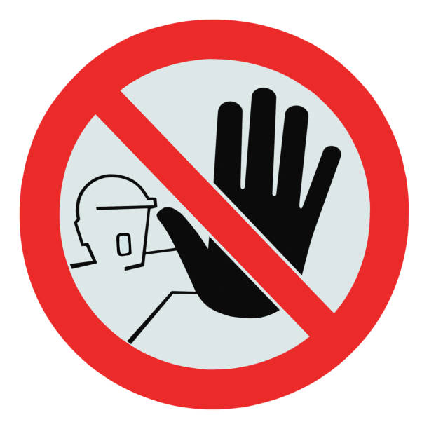 istock No access for unauthorized persons warning sign, large detailed isolated macro closeup, round sign, red crossed frame, construction site occupational safety and health OSHA concept 1403888105