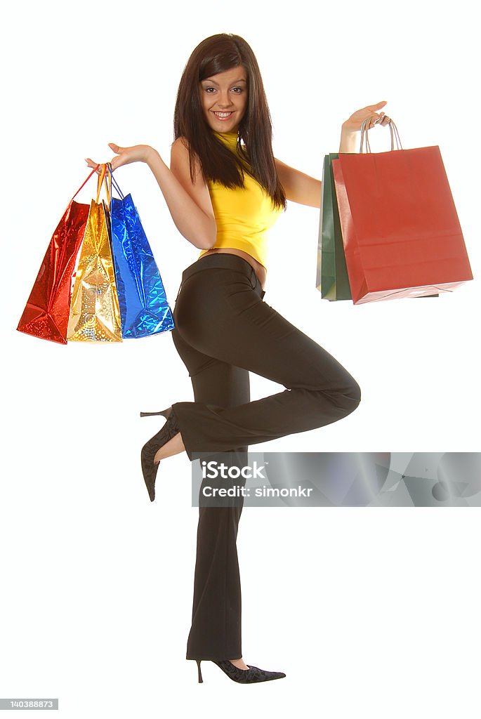 Attraente brunette fare shopping - Foto stock royalty-free di Abbigliamento casual