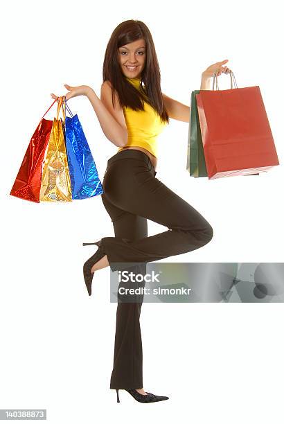 Attraente Brunette Fare Shopping - Fotografie stock e altre immagini di Abbigliamento casual - Abbigliamento casual, Adulto, Allegro