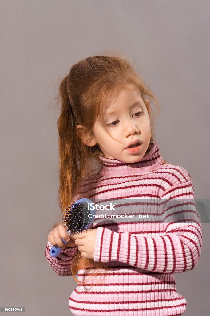Chica con peine - Foto de stock de Bebé libre de derechos