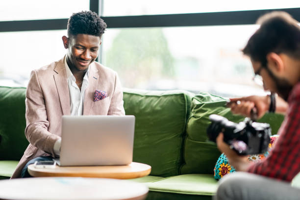 istock African vlogger video shooting with cameramen 1403892016