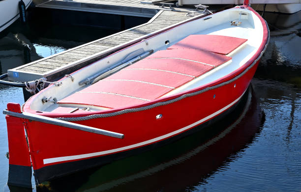 istock Red fishing boat in a marina 1403893164