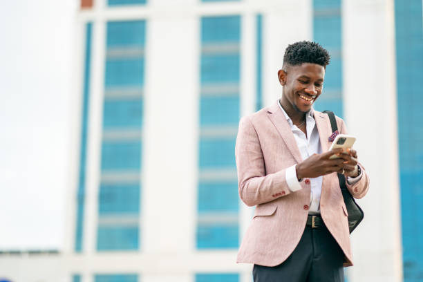 istock Ivory Cost Businessman using smart phone 1403893366