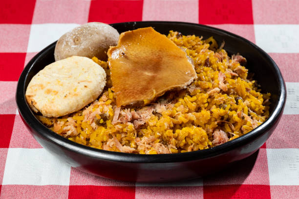 Typical tolimense lechona with rice - Typical Colombian dish Suckling pig with rice, potato, arepa - Typical Colombian gastronomy tolima stock pictures, royalty-free photos & images