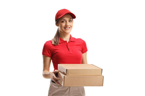 istock Delivery woman holding boxes 1403896382