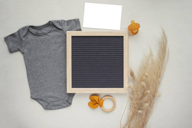 istock Neutral pregnancy announcement flat lay 1403900456