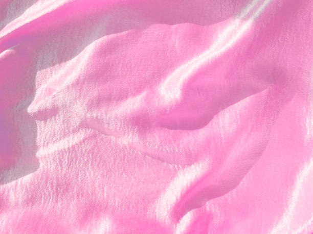 istock beautiful pink silk fabric 1403904419