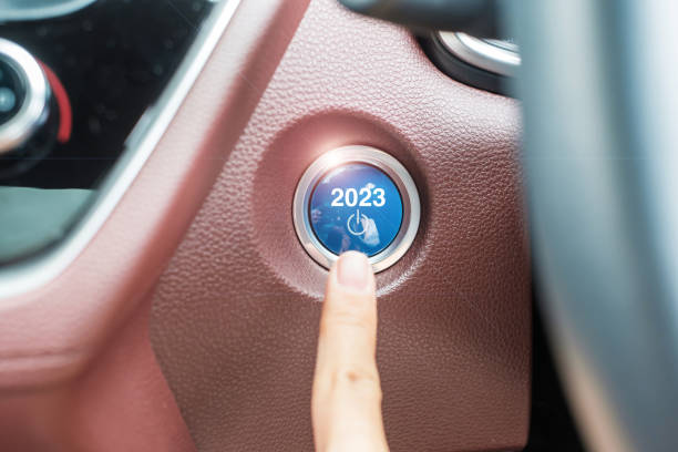 istock Finger press a car ignition button with 2023 START text inside  automobile. New Year New You, forecast, resolution, motivation, change, goal, vision, innovation and planning concept 1403919137
