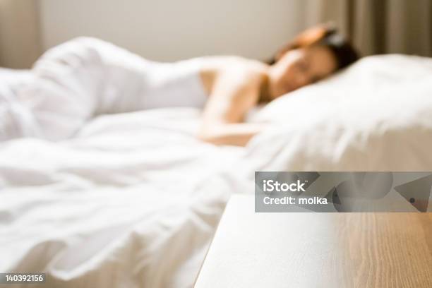 Woman Taking A Nap Stock Photo - Download Image Now - Adult, Bed - Furniture, Bedroom