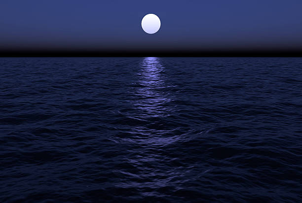 istock Ocean waves are gently rolling along in the moon's reflection 140392481