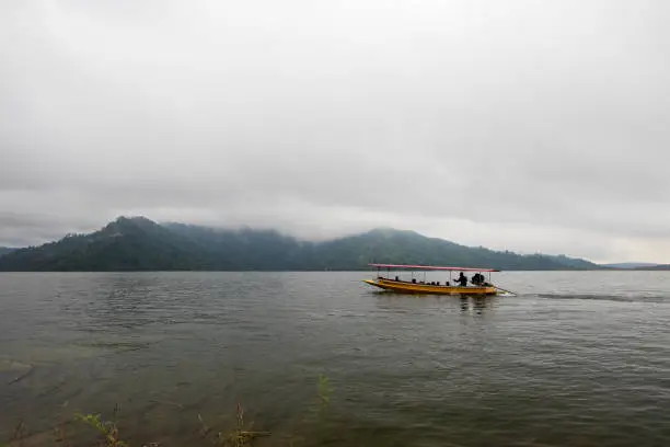 Photo of Beautiful natural scenery under rain clouds and overcast skies.