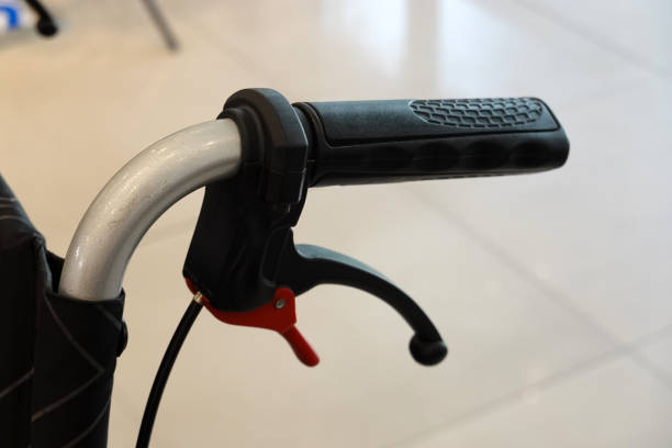 Close up Handle and brake of wheelchair. break and lock system.