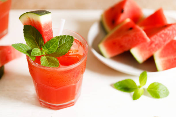 istock Fresh watermelon juice with ice in a glass. 1403935462