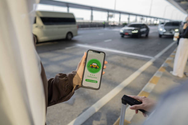 istock Two Asian Beautiful woman is calling a bus through an application. 1403935477