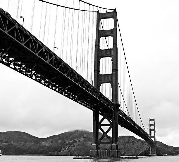 die golden gate bridge - golden gate bridge bridge weather california stock-fotos und bilder