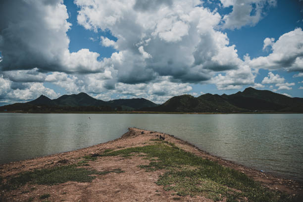 istock Beautiful Lam Taphen Reservoir Tranquil water, reflection, forest, viewing deck. 1403937197