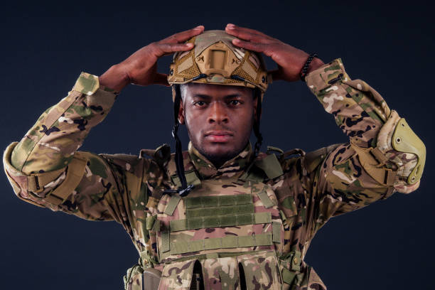 istock american man in camouflage suit sorrow 1403940652