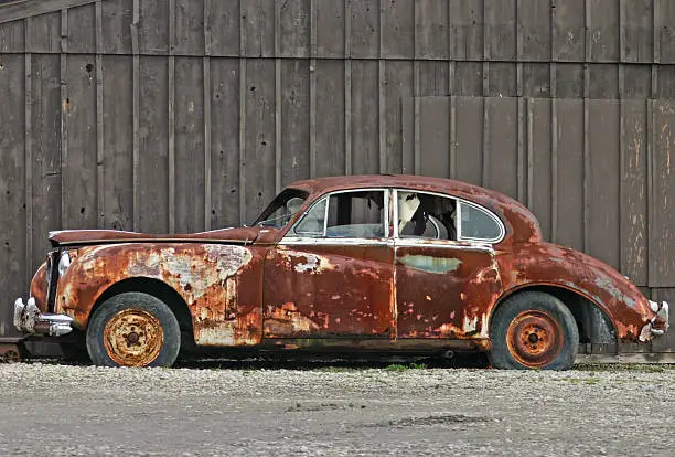 Old Rusty Rolls Royce Off the Side of a Country Road