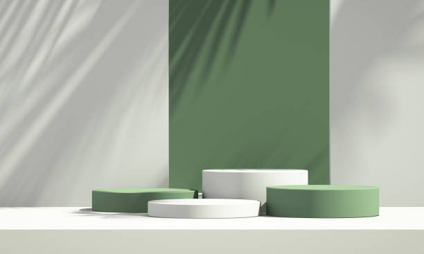 istock 3D green product podium display with green and white background and tree shadow,summer product mockup background,3D render illustration 1403943157
