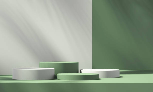 istock 3D green product podium display with green background and tree shadow,summer product mockup background,3D render illustration 1403943174