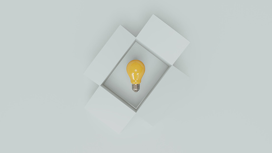 Yellow lightbulb inside of open white on blue background for creative thinking idea concept by 3d render.