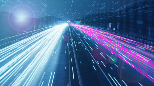 istock 3D rendering of warp speed in a hyper loop with blurred light from building lights in a metropolis at night. Next generation technology concept, fintech, big data, 5g fast network, machine learning 1403948105