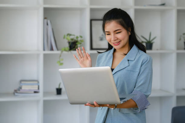 istock data analysis, budget calculation, research, risk management, portrait of Asian women using computers and financial documents in capital planning to increase company profits 1403948353