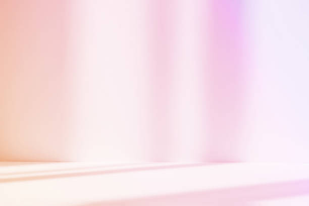 istock Abstract pink studio background for product presentation. Empty room with shadows of window. Display product with blurred backdrop. 1403949184