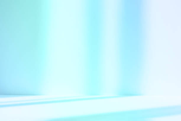 istock Abstract blue studio background for product presentation. Empty room with shadows of window. Display product with blurred backdrop. 1403949197
