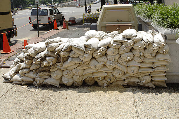 istock Sandbag Wall to Stop Flood waters on Street 140394997