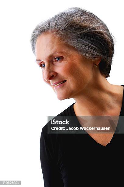 Senior Businesswoman Looking Away In Thought Stock Photo - Download Image Now - One Woman Only, Women, 40-44 Years