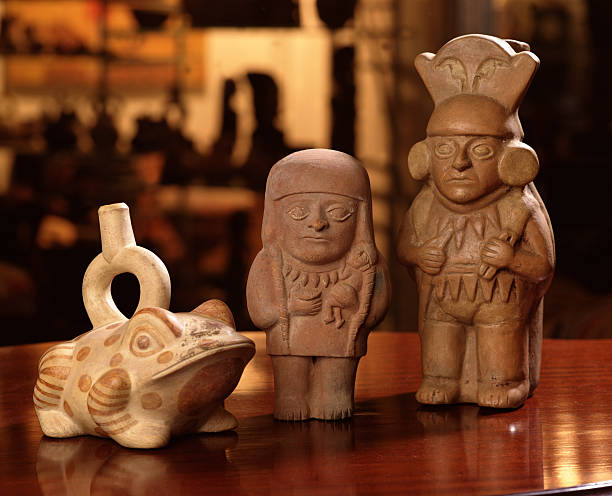 Alto do Moura's neighborhood in Caruaru, Pernambuco, is known for colorful ceramic art, made of clay. Focus on looking through caracters.
